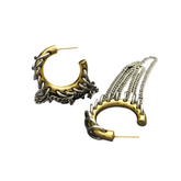 Aro abierto con cadena punk y borla larga exagerada