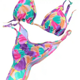 Two-piece high-cut bikini set in blue with mid-waist bottoms.