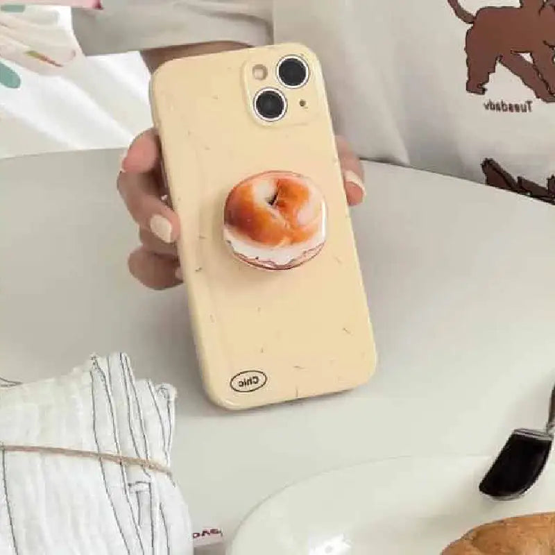 Beige Back Cover With a Bagel-Shaped Folding Holder Stand