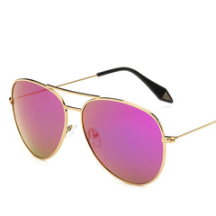 Classic aviator sunglasses with mirrored lens and gold metal frame detail shot