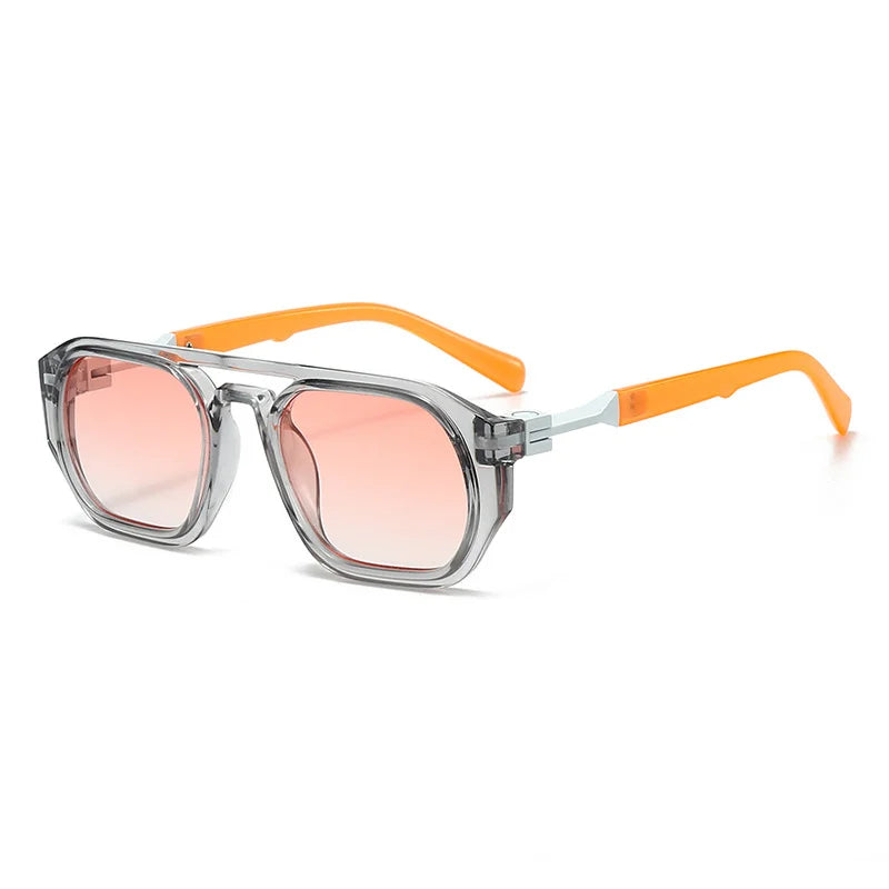 Clear frame sunglasses with pink tinted lens and orange acetate arm, bold casual eyewear style