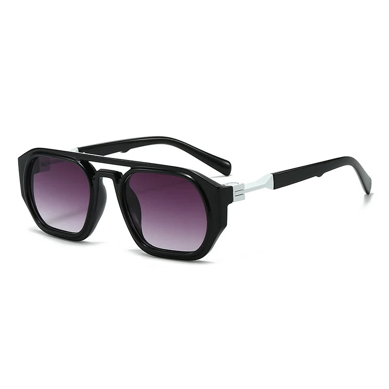 Clear frame sunglasses with pink tinted lens and orange arm detail, closeup of acetate material and gradient design