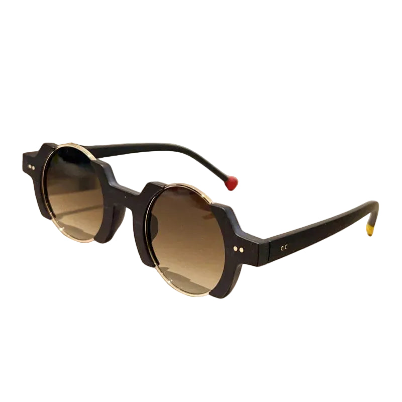Close up of round frame sunglasses with colorful bubble detail and blue tinted lenses
