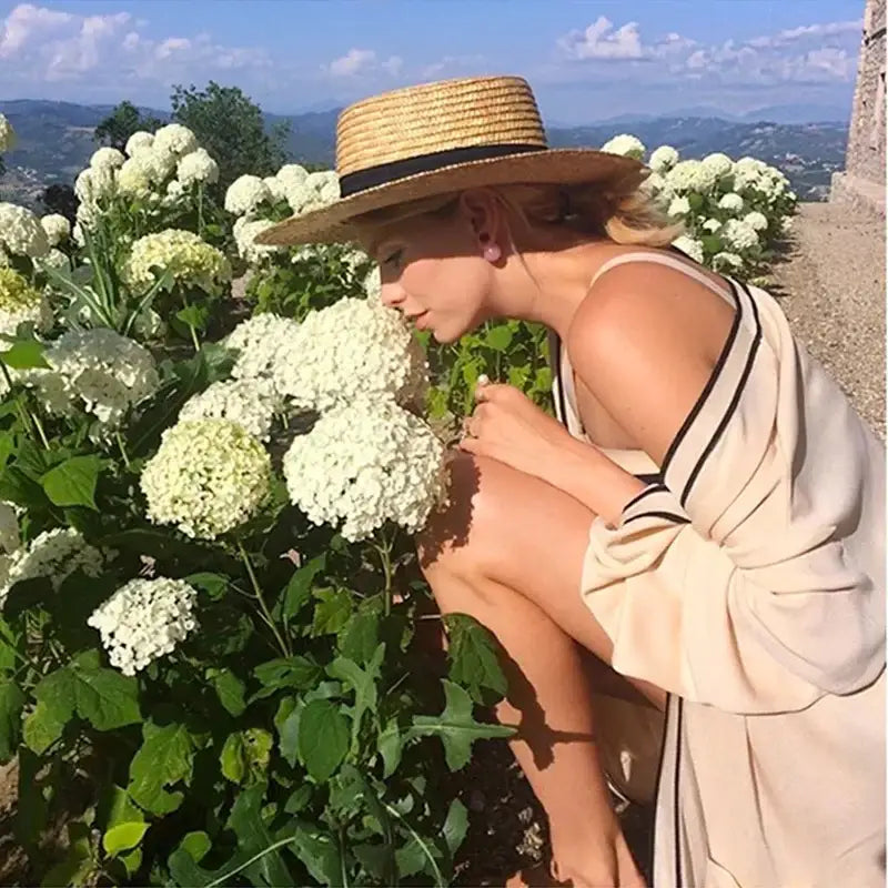 Flat Straw Hat With Black Bow