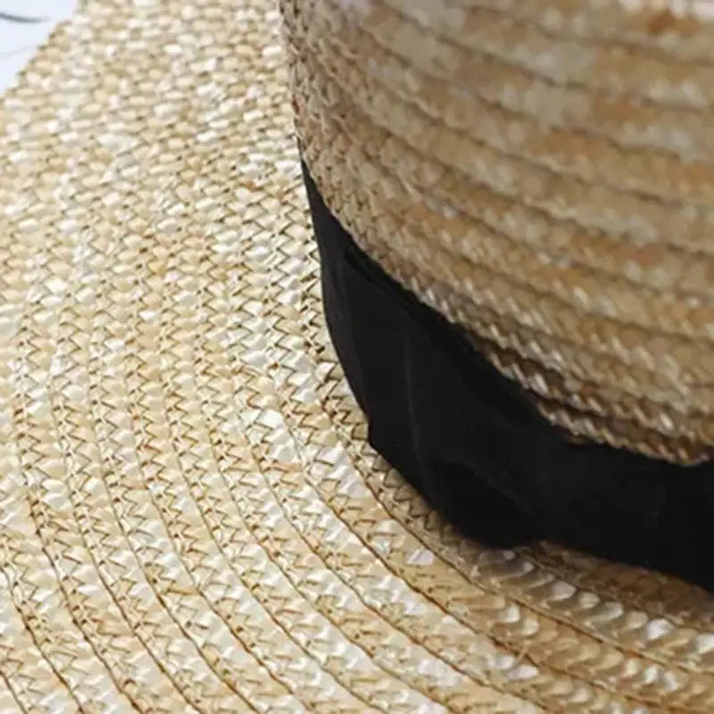 Flat Straw Hat With Black Bow