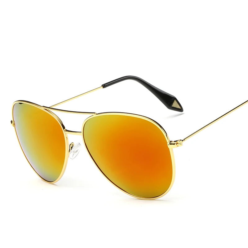 Gold frame aviator sunglasses with mirrored lens detail showing reflection and material finish