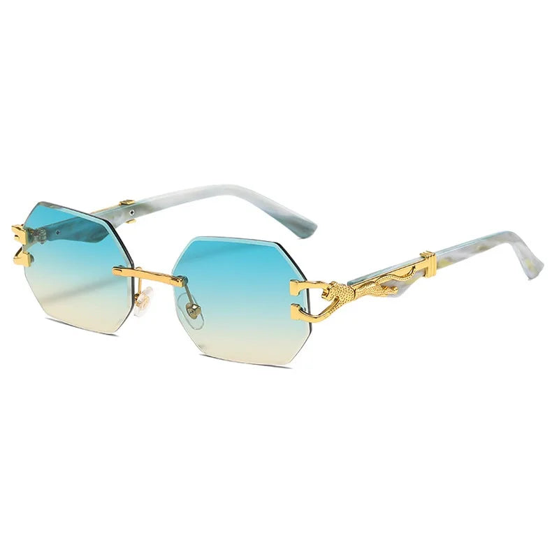 Hexagon rimless sunglasses with gold metal frame detail and blue gradient lens close up