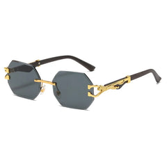 Hexagon rimless sunglasses with gold metal frame showing blue gradient lens and decorative temple detail up close