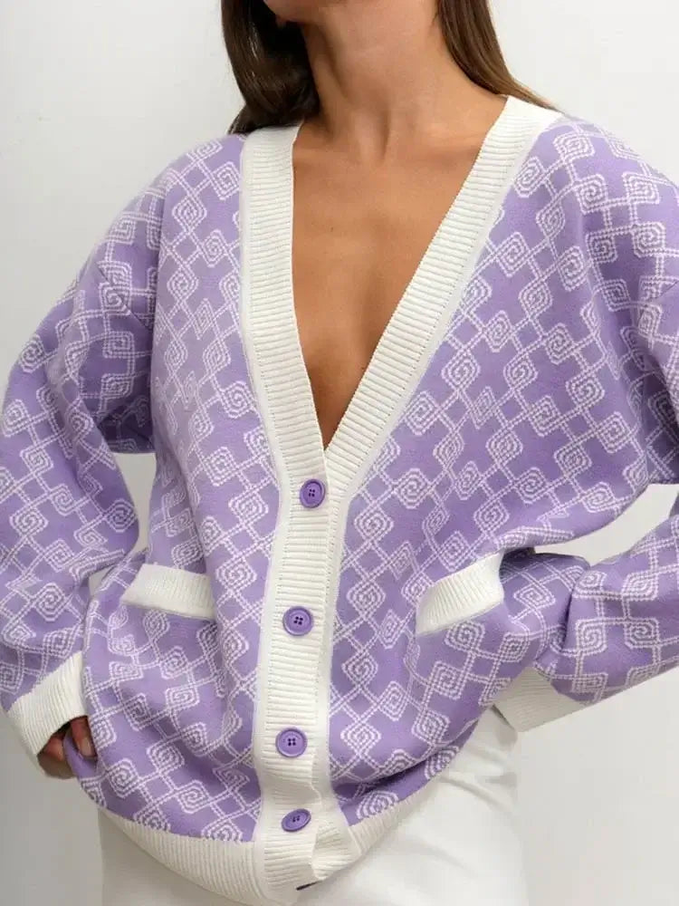 Knitted Oversized V Neck Long Sleeve Cardigan in lavender with button closure and geometric pattern.