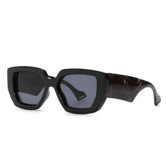 Marble acetate oversized square frame sunglasses showcasing textured material detail and bold design