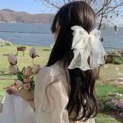 Metal Chic Bow Clip for Stylish Hair Looks Wavy White