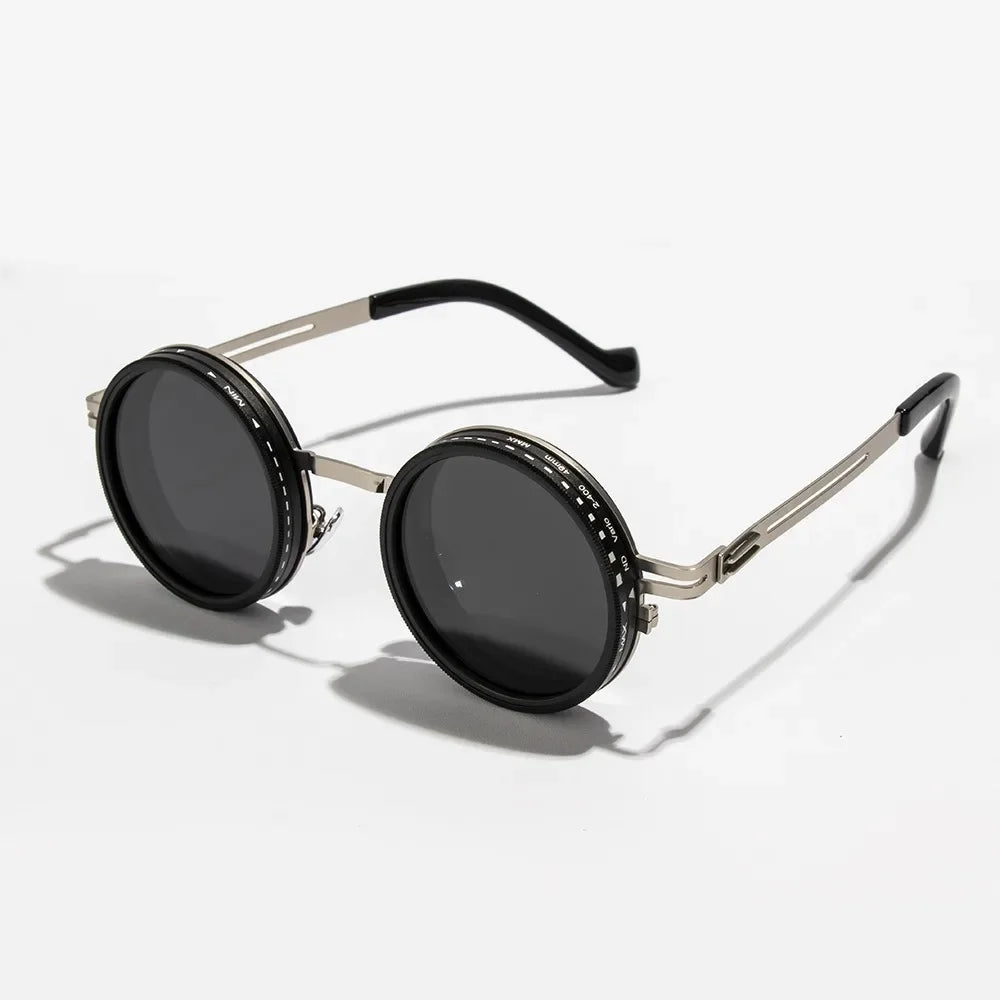 ND2 400 adjustable dimming sunglasses close up of gold and black frame material detail