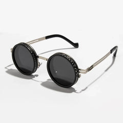 ND2 400 adjustable dimming sunglasses close up of gold and black frame material detail