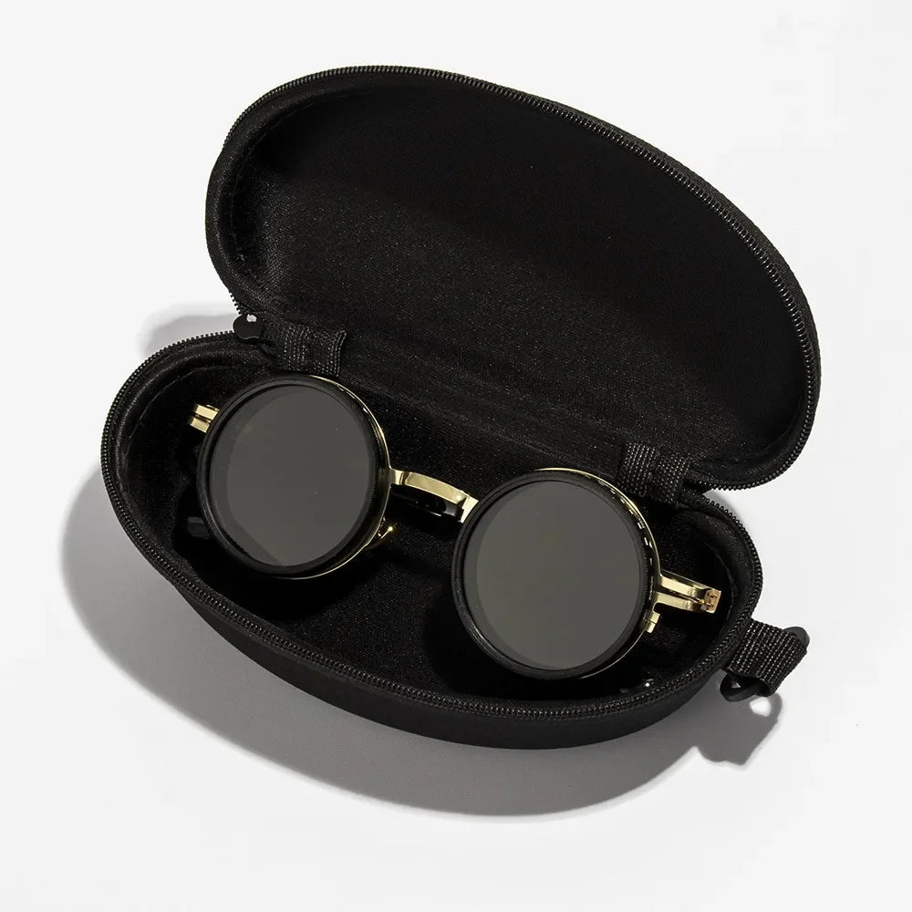 ND2 400 adjustable dimming sunglasses with gold and black frame detail close up