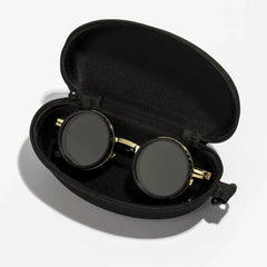 ND2 400 adjustable dimming sunglasses with gold and black frame detail close up