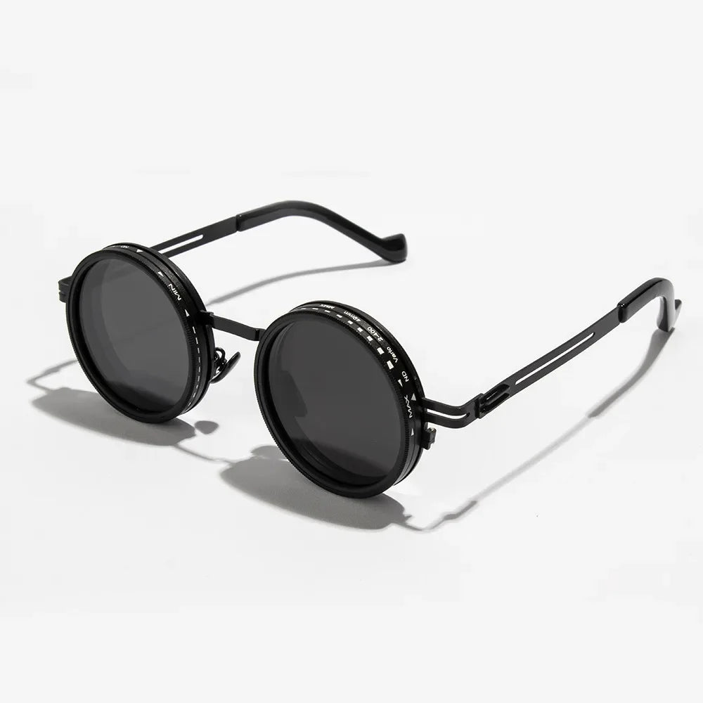 ND2 400 adjustable dimming sunglasses with gold and black frame detail, close-up material view.