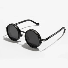 ND2 400 adjustable dimming sunglasses with gold and black frame detail, close-up material view.
