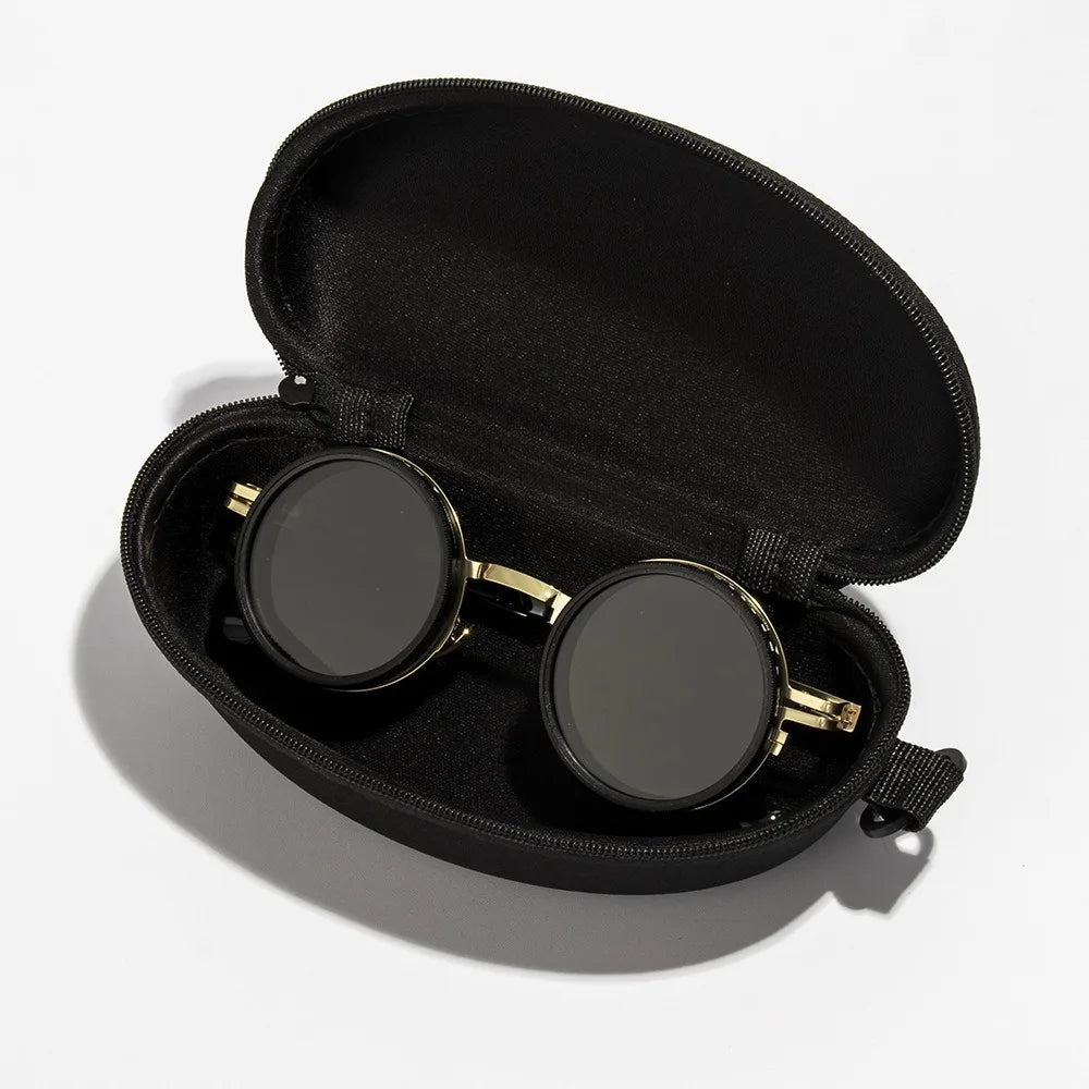 ND2 400 adjustable dimming sunglasses with gold and black frame detail close-up