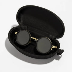ND2 400 adjustable dimming sunglasses with gold and black frame detail close-up