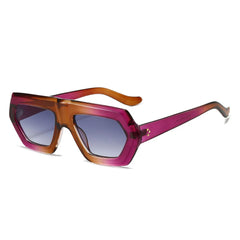 Oversized color block sunglasses with amber tortoiseshell frame and gradient lens detail close-up