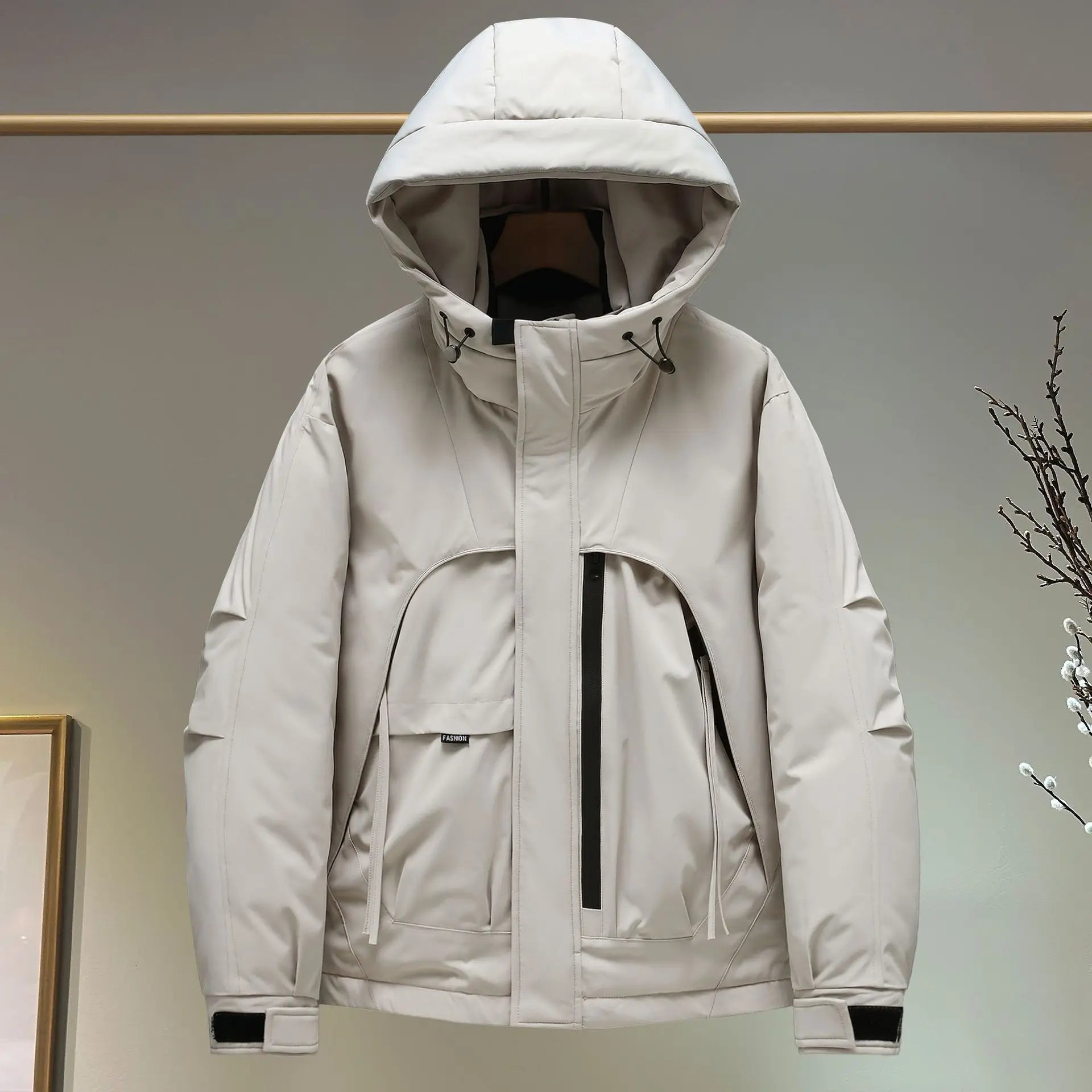 Oversized Hooded Windbreaker Jacket in beige, featuring a durable polyester build, zip-up closure, and functional pockets for outdoor wear.