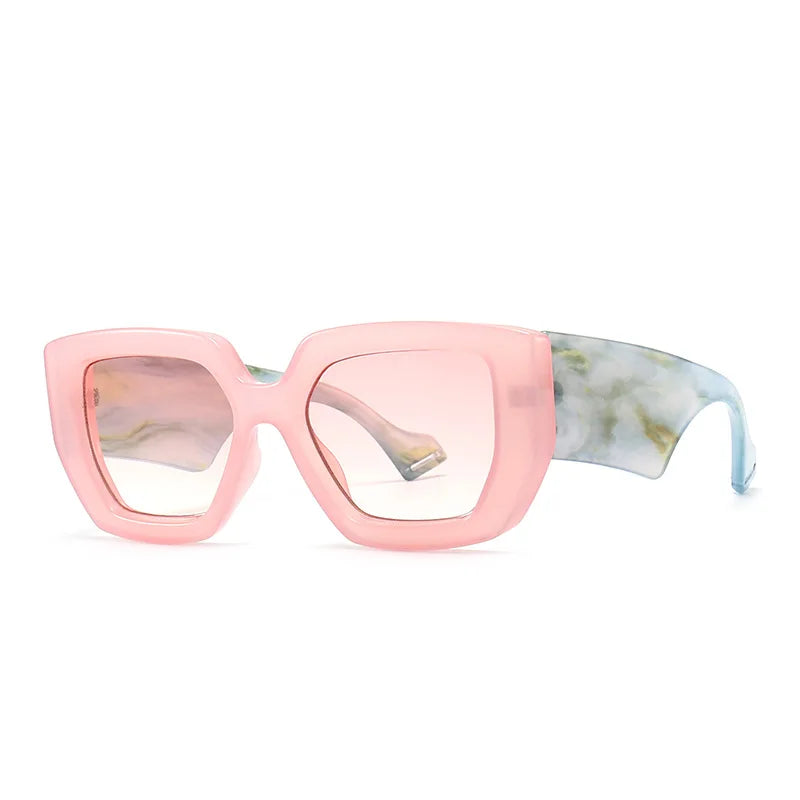 Oversized square frame sunglasses in marble acetate showing close up detail of texture and material finish