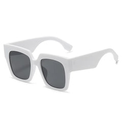 Oversized square sunglasses with blue tortoiseshell gradient lens detail and bold frame styling