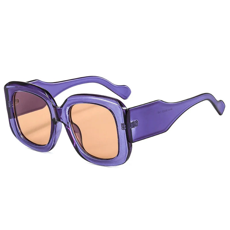 Oversized square sunglasses with chunky resin frame and gradient colorway detail close-up