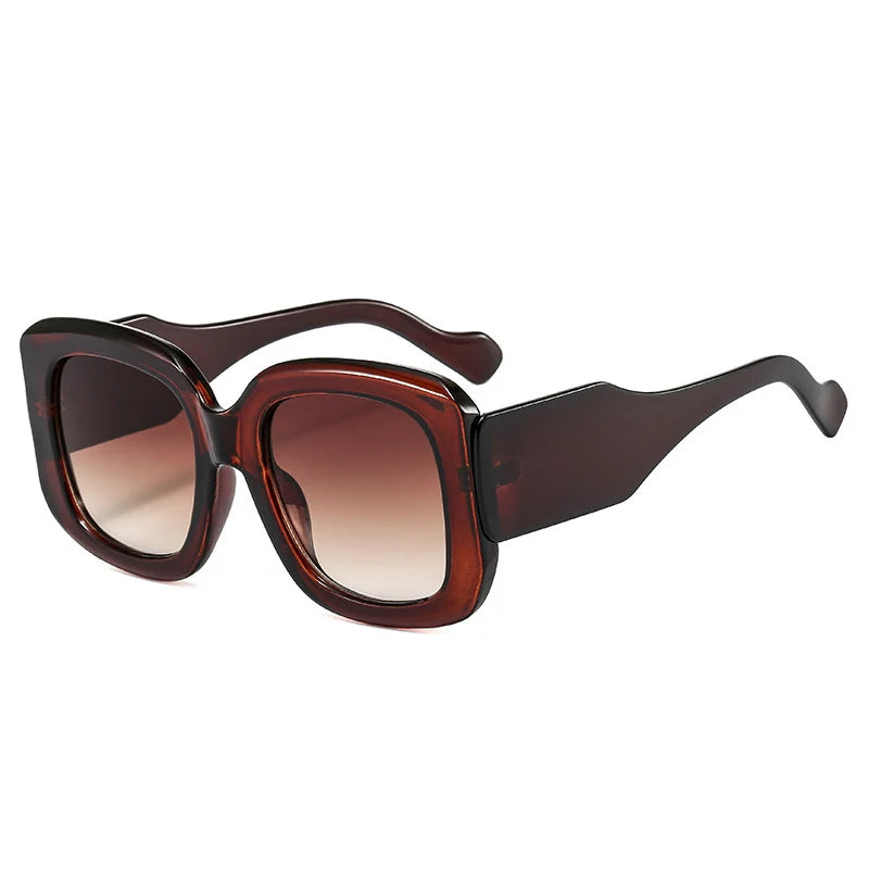 Oversized square sunglasses with chunky resin frame and gradient colorway showing UV protection details