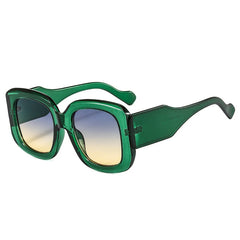 Oversized square sunglasses with chunky resin frame detail and gradient colorway close-up