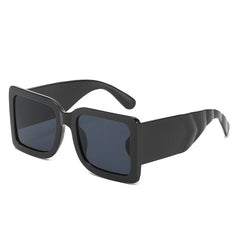 Oversized square sunglasses with mint vegan leather arms and bold black frame detail