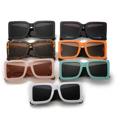 Oversized square sunglasses with mint vegan leather arms and bold color block design detail