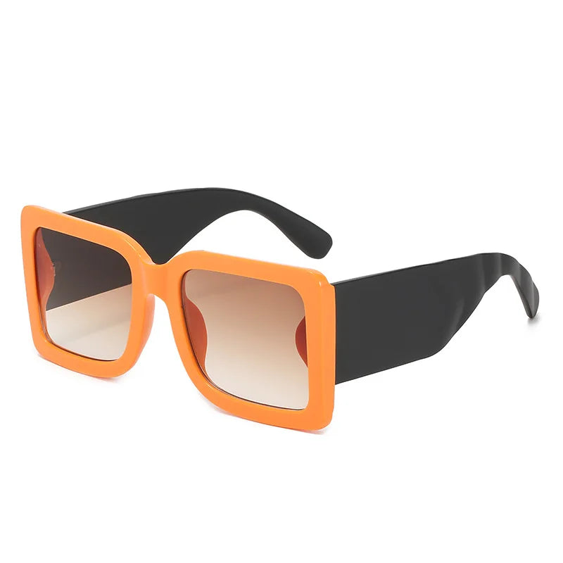 Oversized square sunglasses with mint vegan leather arms detail close up