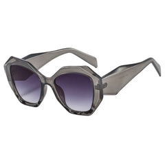 Oversized tortoiseshell hexagon sunglasses with green gradient lens detail and bold frame material texture