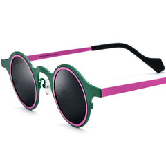 Retro round frame sunglasses with bold colorful lens and detailed frame material close up
