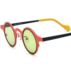 Retro round frame sunglasses with bold colorful lens detail and close up material texture view