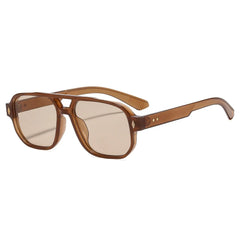 Tortoiseshell acetate frame detail of retro aviator sunglasses with blue lenses