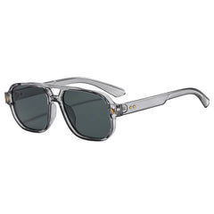 Tortoiseshell acetate frame detail on retro aviator sunglasses with blue lenses