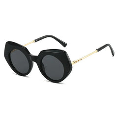 Tortoiseshell oversized round frame sunglasses highlighting chunky acetate material and bold design details.