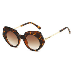 Tortoiseshell oversized round frame sunglasses showcasing chunky acetate material and bold alternative fashion design detail.