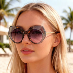 Tortoiseshell oversized round frame sunglasses showcasing chunky acetate material and bold alternative fashion design detail.