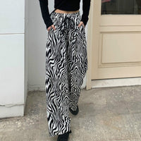 Thumbnail for Lace-up Zebra Pattern Striped Flare Leg Pants